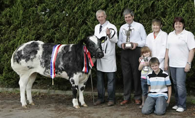 Ivan and Corrina Gordon with Jenny Sophie and James who were supreme champions with judge Wilfred Lomas